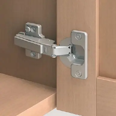 Charnière BLUM à visser pour porte épaisse